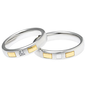 jegygyűrű , sárga szögletes mintával gyémánt kővel