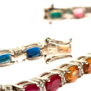 gyémánt karkötő , smaragd-zafír és egyéb színes drágakövek